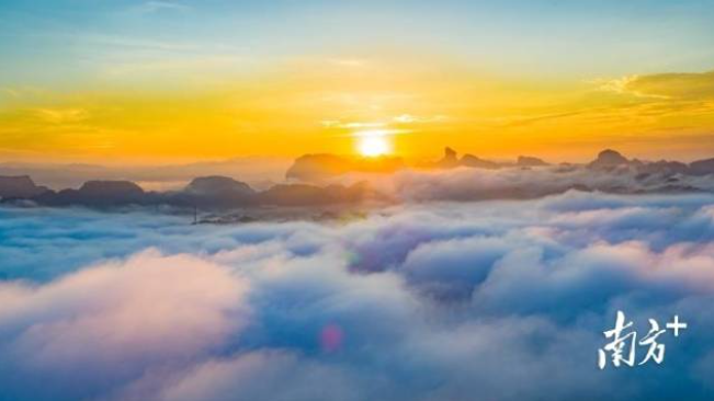 Cloud seas engulf Danxia, earthly realm cradles celestial | MicroInPixels